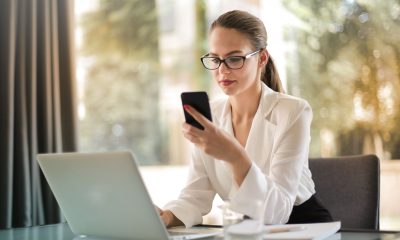 a woman looking at a phone